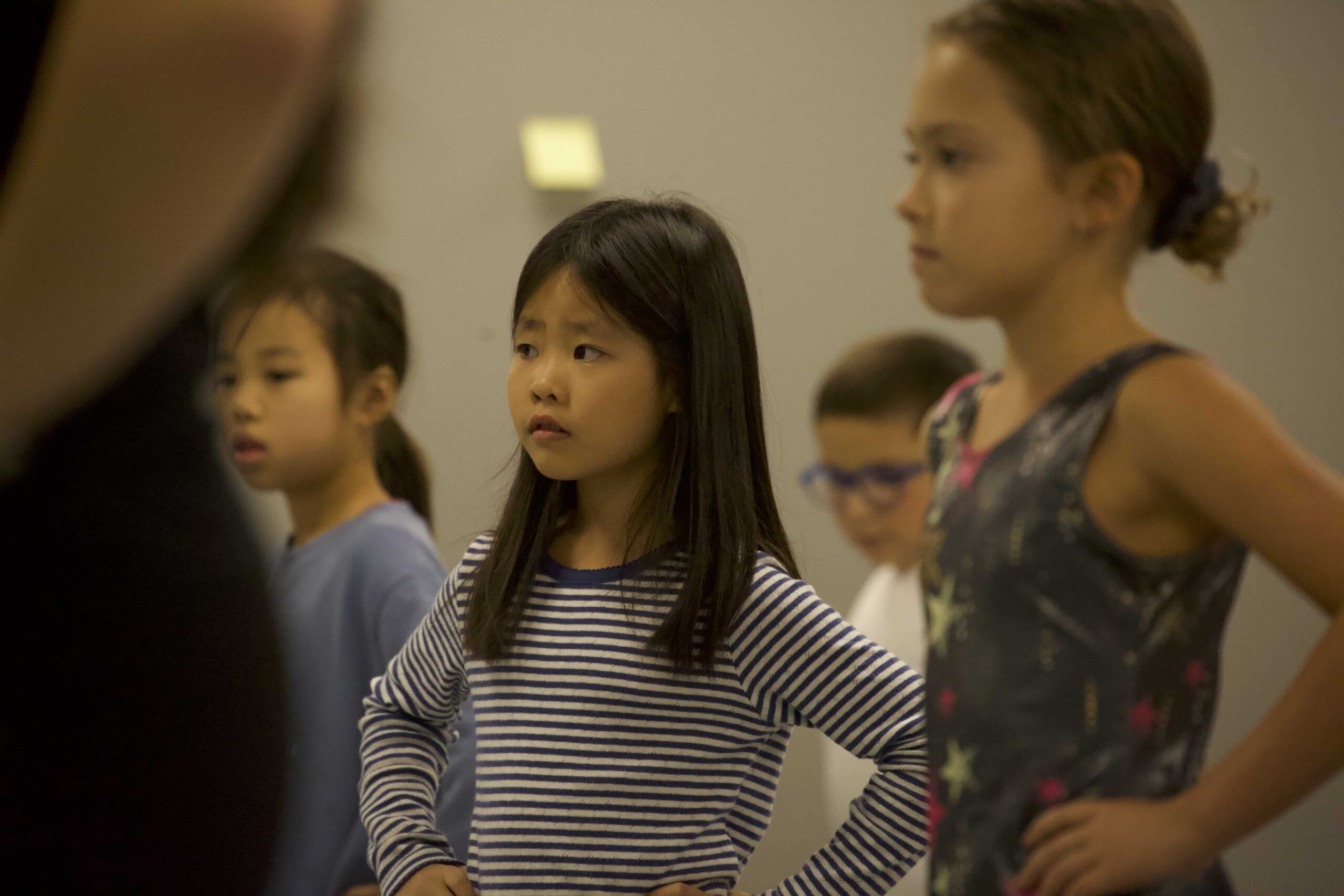 young dancers contemplate dance steps