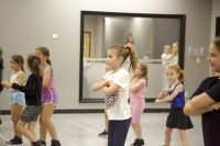 girls dancing and practicing in class